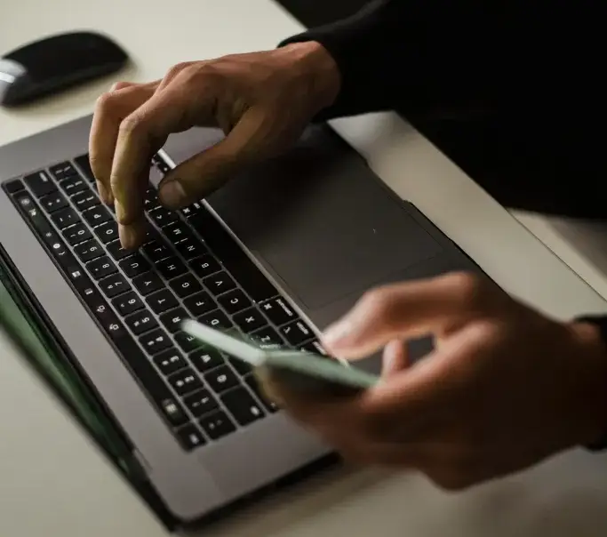 Person Working On A Laptop